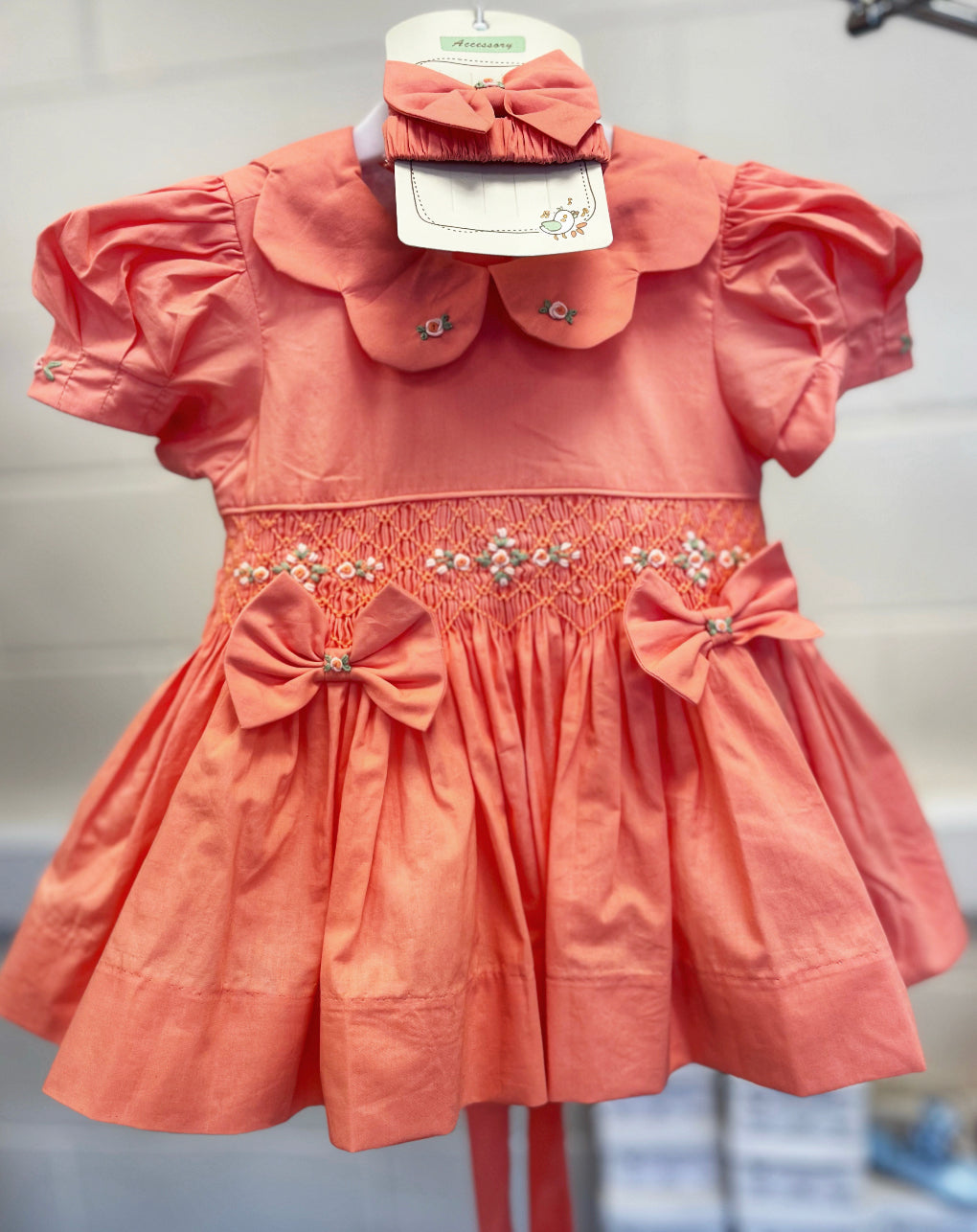 SS23 6months coral smock with hair bow